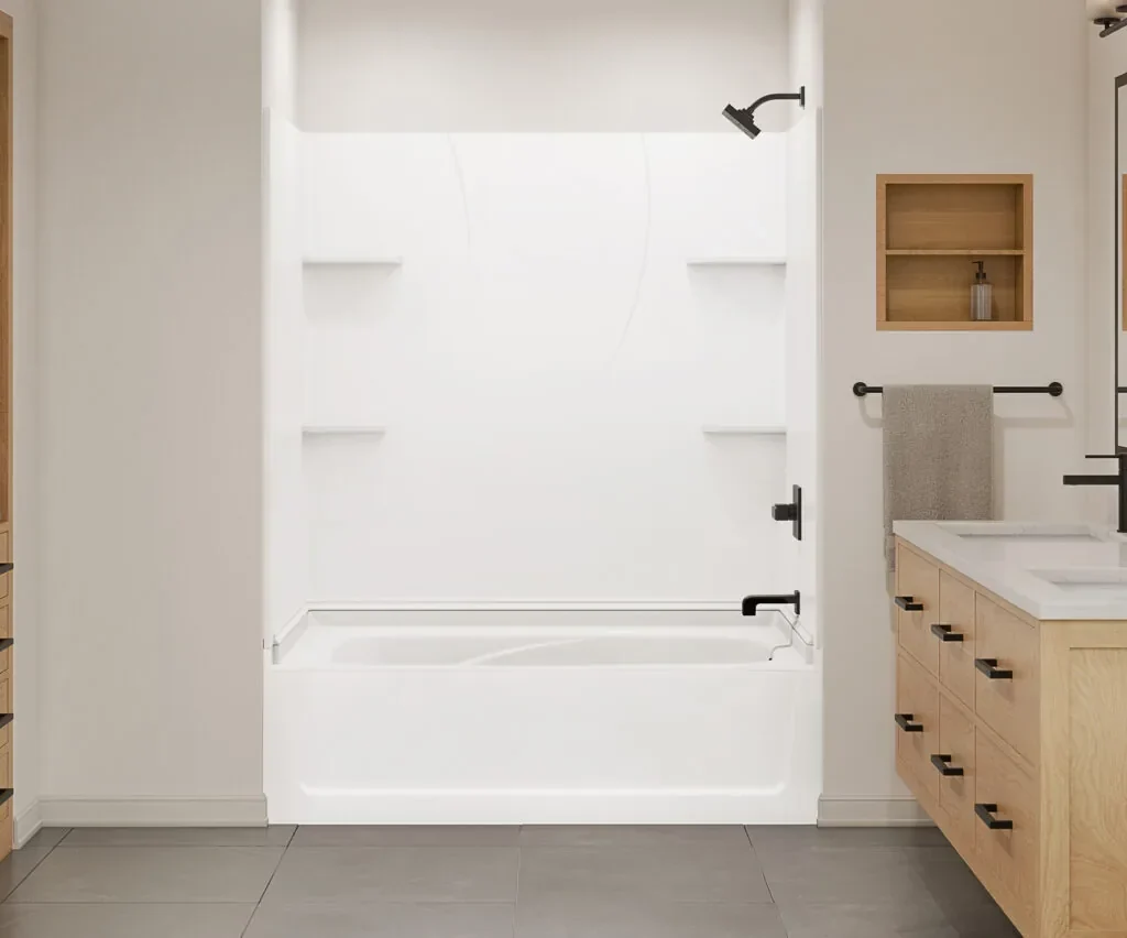 Bright white one-piece fiberglass tub and shower enclosure with matte black fixtures in an Irvine bathroom